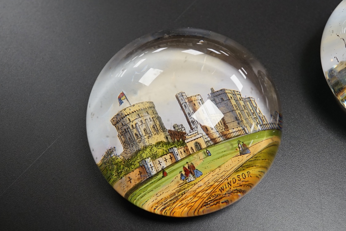 Six pictorial glass gem paperweights and three 19th century scent bottles, largest 11cm in length